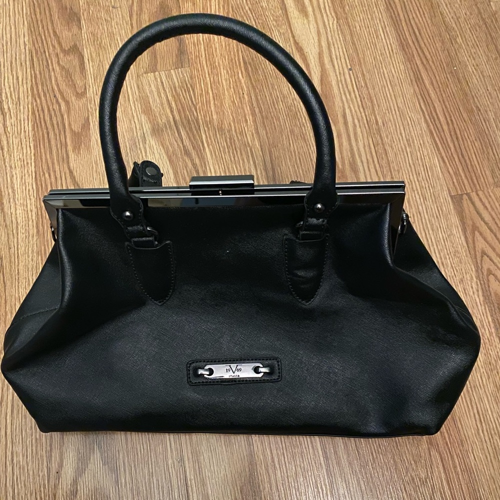 Versace handbag. Vegan. Lightly used. Excellent condition